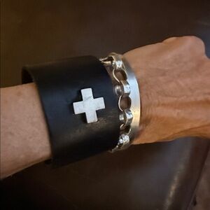 Sterling silver cross on a Black Leather cuff Bracelet with Silver snaps